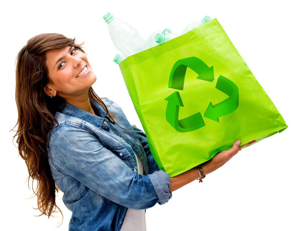 Woman with an ecological bag - isolated over a white background